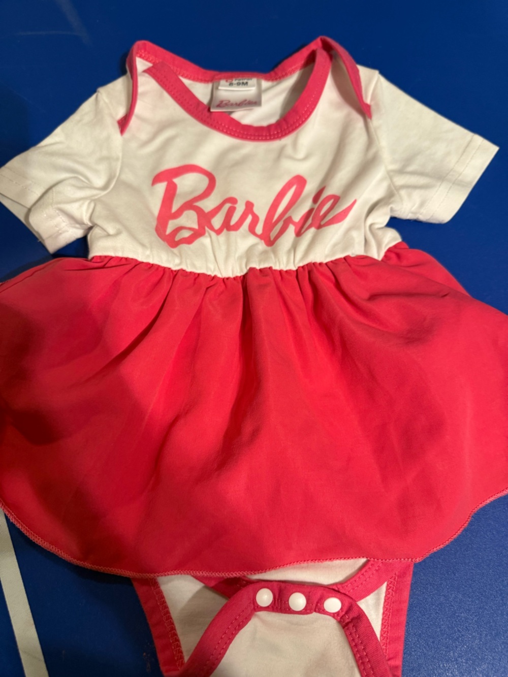 PatPat White Baby Onesie with Pink Trim and Barbie Tag